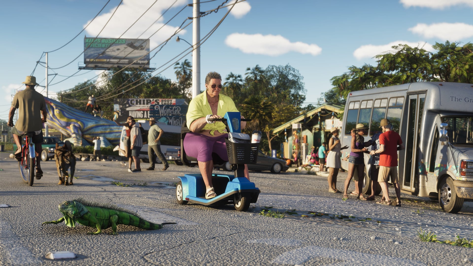 A street scene with food trucks, pedestrians and a mobility scooter in the Leonida Keys.